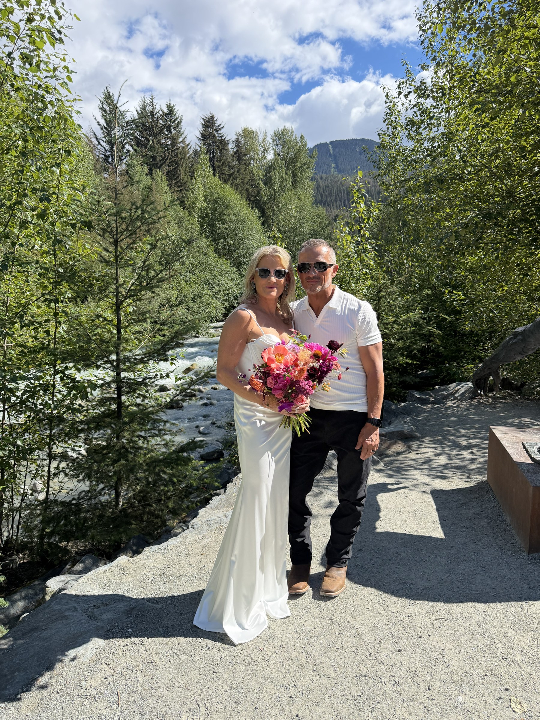 Deb and Daryl in a full-length wedding portrait