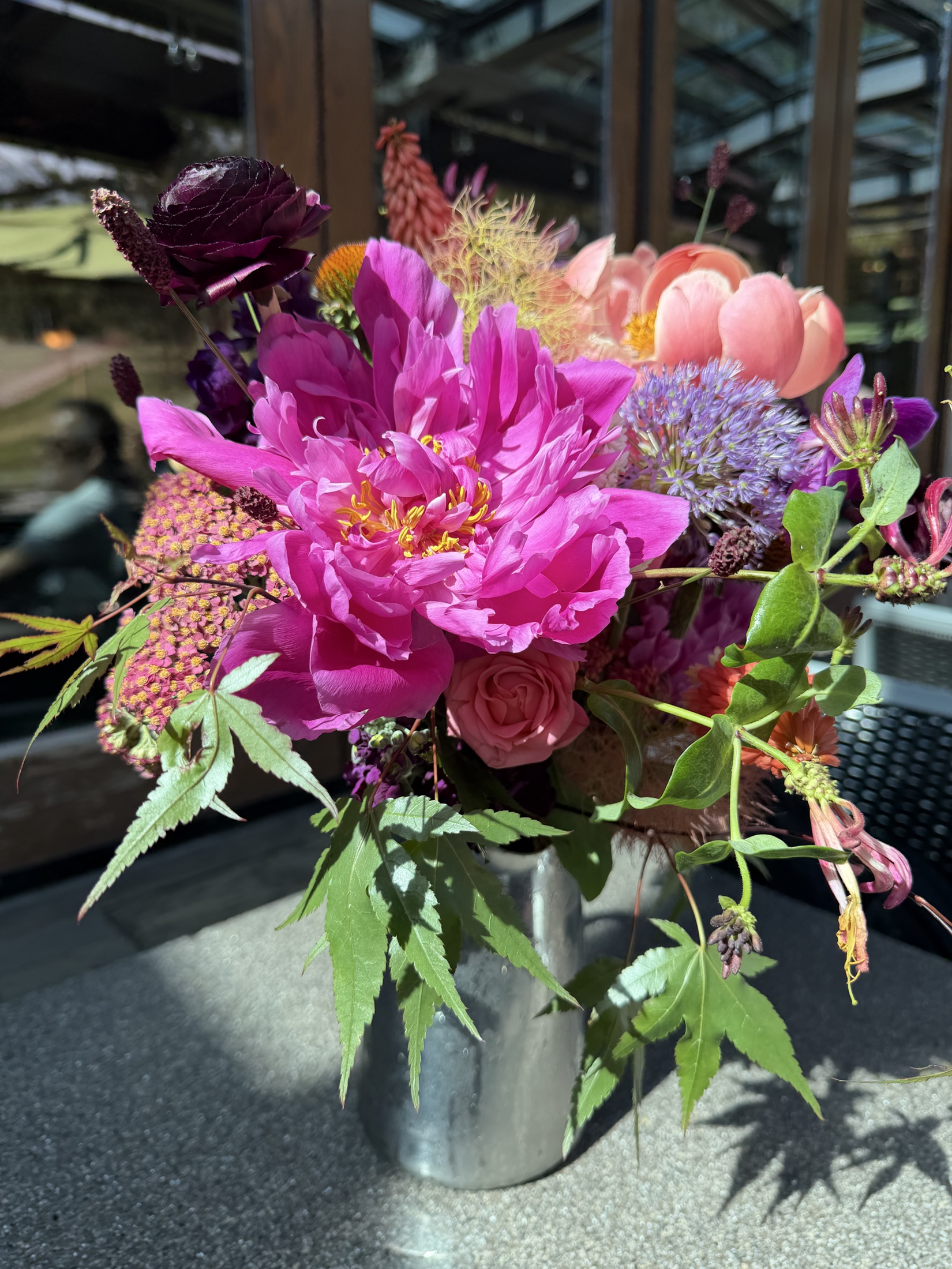 Deb’s vivid pink and purple wedding bouquet